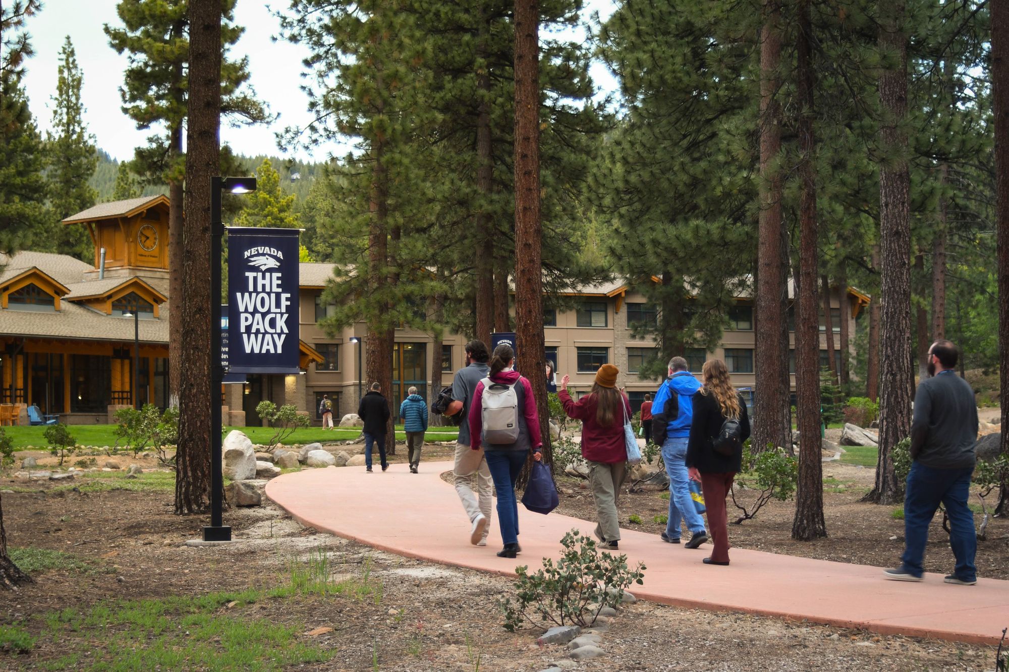 Students walking a forest path on the University of Nevada, Reno at Lake Tahoe campus